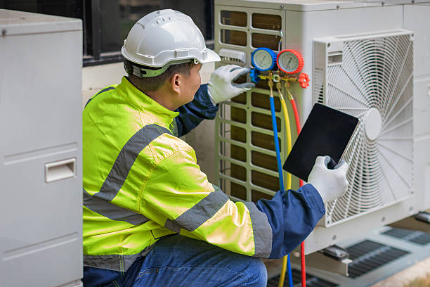 Professional Air Duct Cleaning technician working in Munford, TN